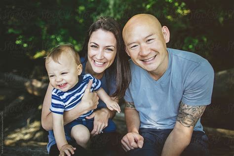 "Young Mixed-race (caucasian, Asian) Family Enjoying Each Other Outside ...