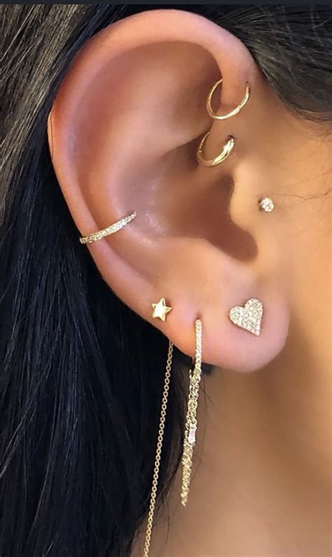 cute feminine multiple gold ear piercing jewelry ideas for women ...