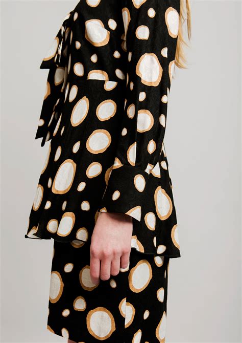 Circle print dress in black.