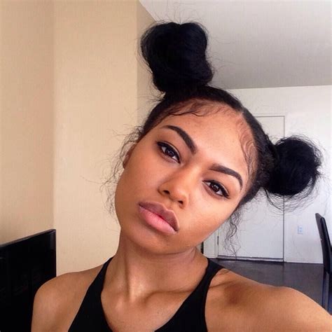 Two Buns Hairstyle With Weave
