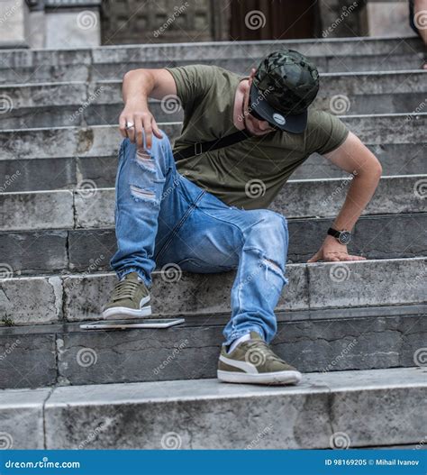 Angry Guy Stomping on His Tablet. Stock Image - Image of stomping