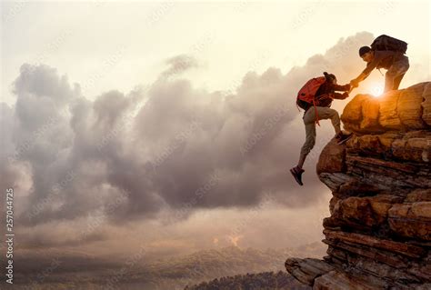 people helping   hike   mountain  sunrise giving