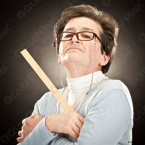 Old strict teacher with glasses isolated on black - stock photo 161506