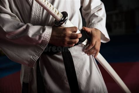 Young Martial Arts Fighter with Katana Stock Photo - Image of steel ...