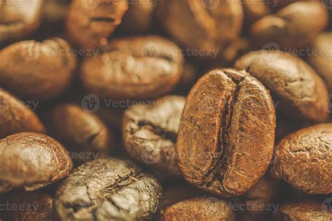 Roasted coffee beans closeup background 11183479 Stock Photo at Vecteezy