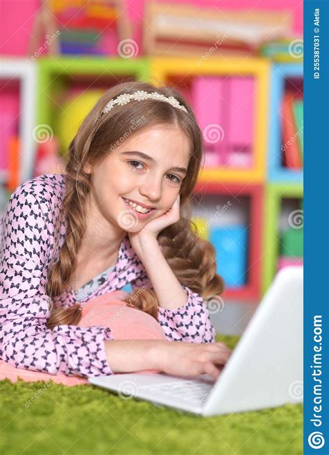 Teenage Girl with Laptop Lying on Carpet at Home Stock Image - Image of ...