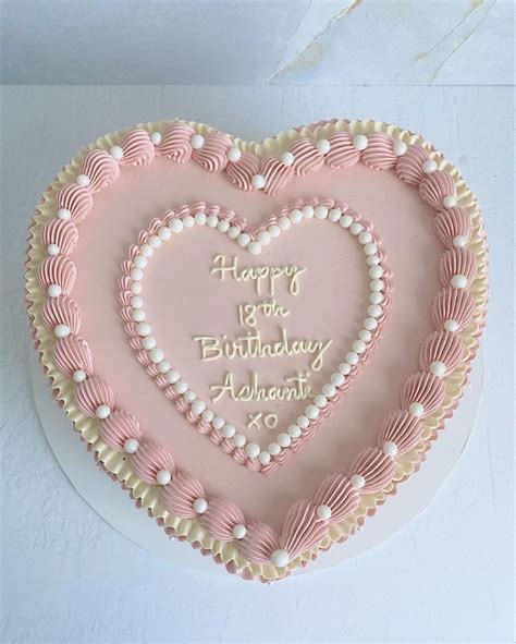 heart shaped birthday cake  pink frosting