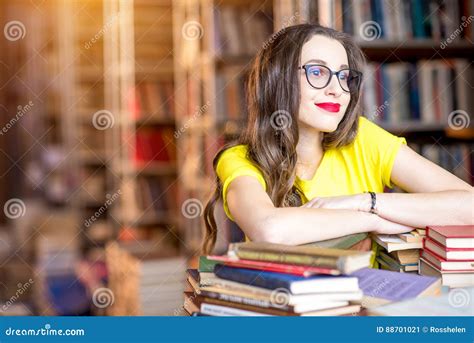 Student at the library stock image. Image of shelves - 88701021