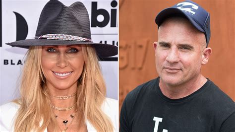 tish cyrus seemingly confirms relationship  prison break star