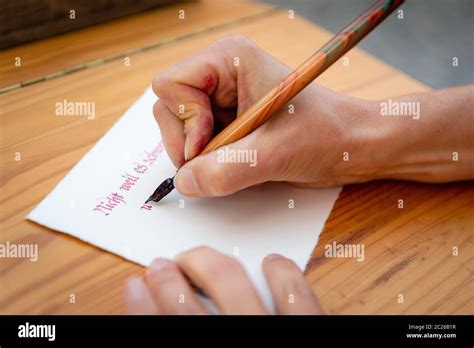 Writing with a quill Stock Photo - Alamy