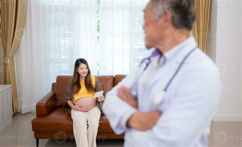 Portrait of obstetrician gynecologist, Asian pregnant woman visit