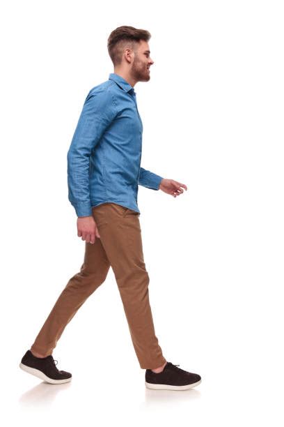man walking sideways stock  pictures royalty  images istock