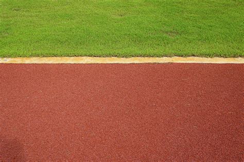 texture of running racetrack red rubber racetracks in outdoor stadium