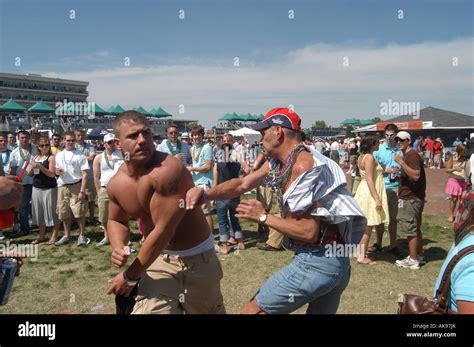 Fighting in the infield of Kentucky Derby Stock Photo - Alamy