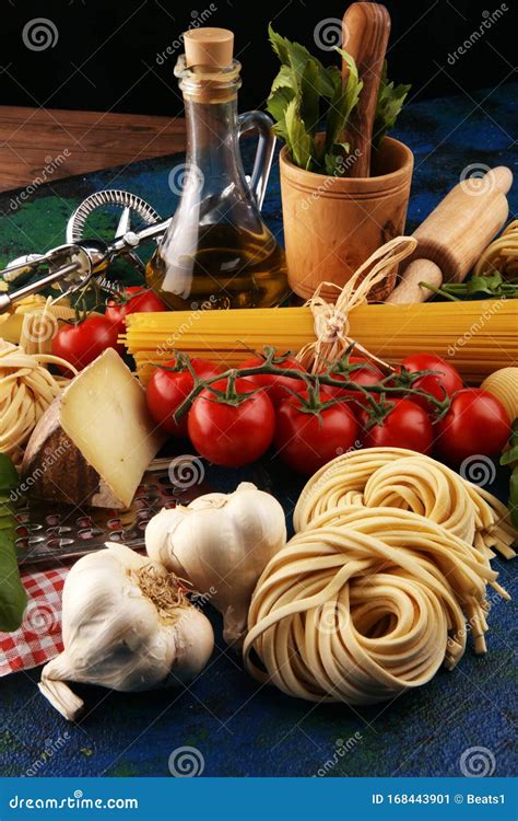 Pasta, Vegetables, Herbs and Spices for Italian Food on Rustic Table ...