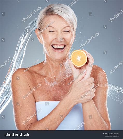 Woman Water Splash Lemon Senior Healthcare Stock Photo 2226798931