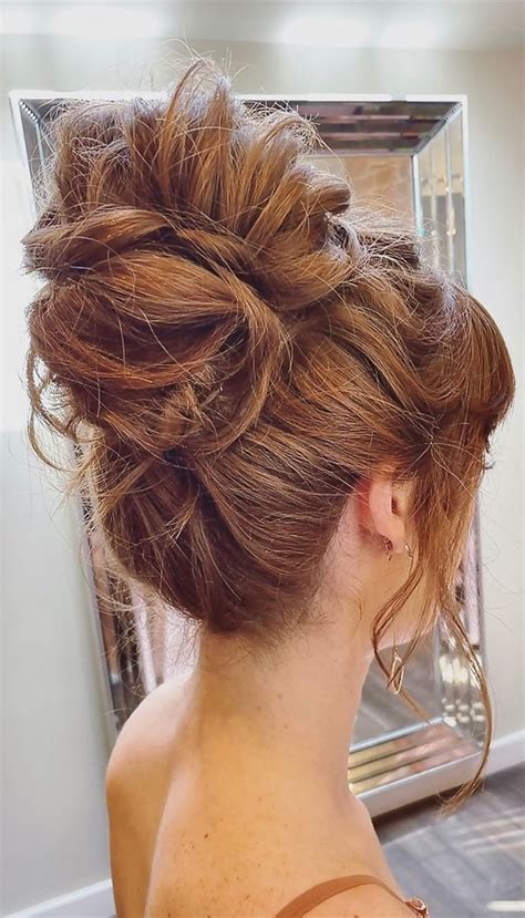 updo hairstyles thatre  stylish  high bun
