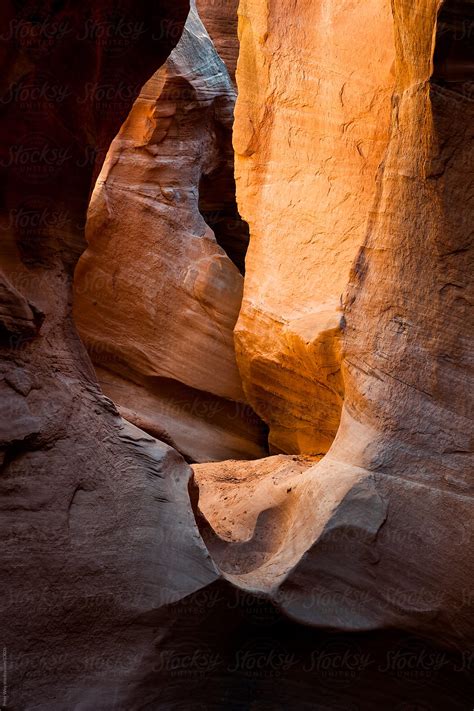 "Peek-A-Boo Slot Canyon" by Stocksy Contributor "Peter Wey" - Stocksy