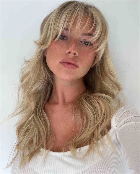 40 Versatile Wispy Bangs Ideas for a Soft and Modern Look 33