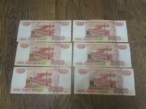 А почему нам не показали новые купюры в 1000 и 5000 рублей ...