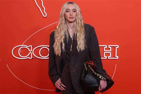 Paige Bueckers rocks the 2025 WNBA Draft orange carpet in a black Coach