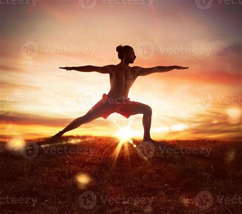 Yoga at sunset 20554600 Stock Photo at Vecteezy