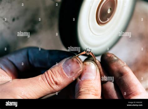 jeweler polishing jewelry stock photo alamy