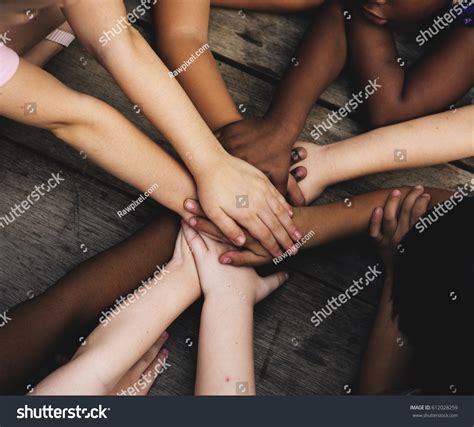 Diverse Hands Join Together On Wooden Stock Photo 612028259 | Shutterstock