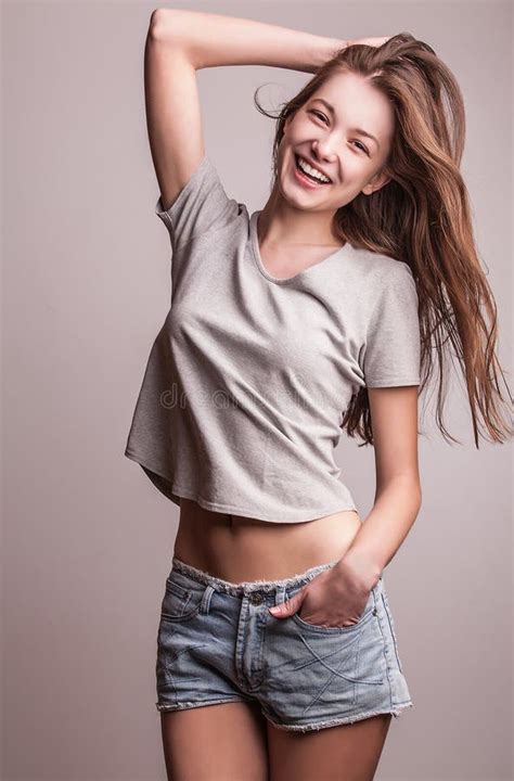 Young Sensual Model Girl Pose in Studio. Stock Photo - Image of beauty