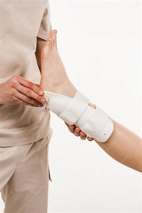 Premium Photo | Ankle and foot external orthosis to reduce pathological
