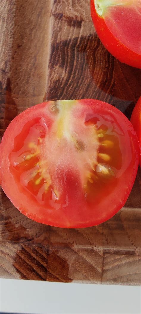 Can someone help me identify if/what is wrong with these tomatoes