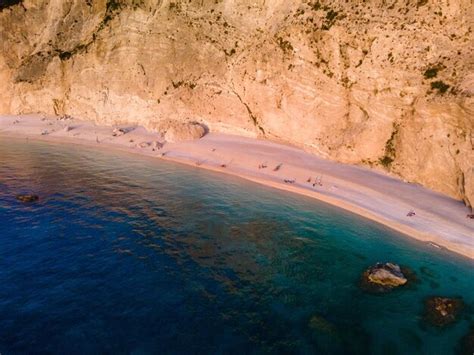 Premium Photo | Overhead view of porto katsiki beach at sunset