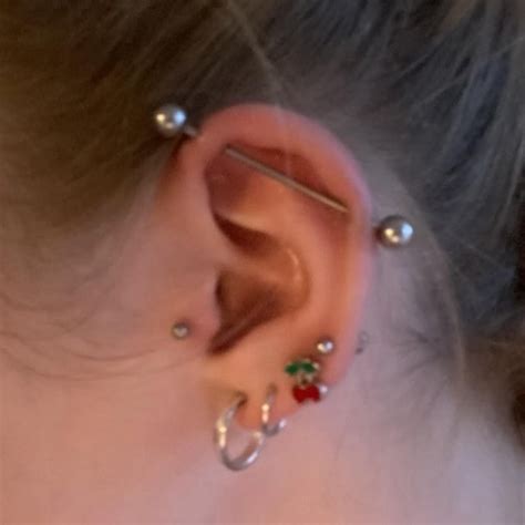 how to know if a piercing is rejecting