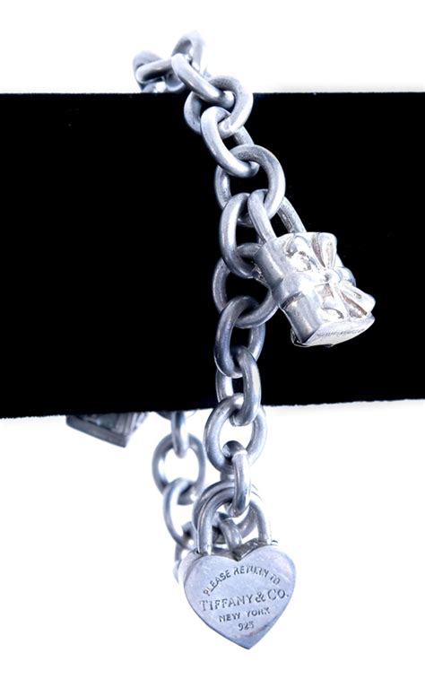 Lot - Tiffany & Co. Return to Tiffany 925 Charm Bracelet