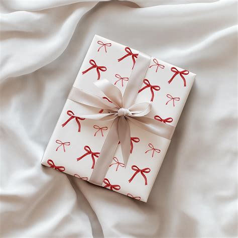 birthday present wrapping paper bow holiday gift wrap red bow wrapping
