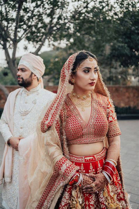 Photo of Contrasting bride and groom outfits