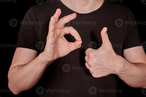Thumbs up and OK signal man hand gesture 12799198 Stock Photo at Vecteezy