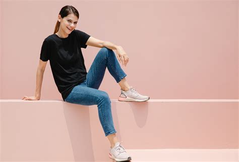 Confident model in casual wear on pastel background · Free Stock Photo