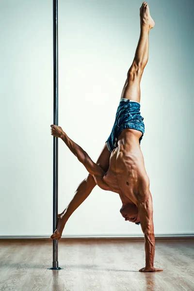 Man pole dancing - Stock Image - Everypixel