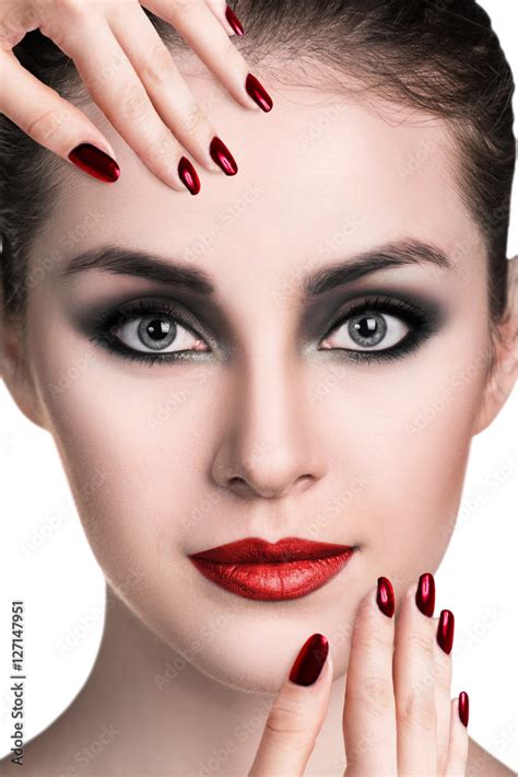 Beautiful woman with smoky eyes makeup Stock Photo | Adobe Stock