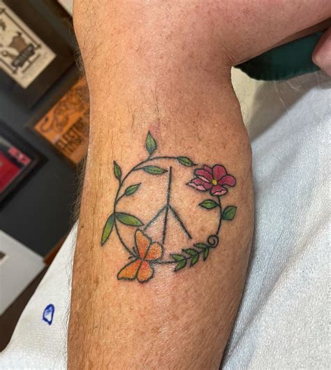 peace sign tattoo 11