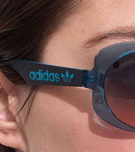 adidas Damen Sonnenbrille Schmetterlings-Brille Gradient-Brille UVA