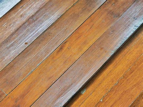 Understanding Hardwood Floor Buckling - Flooring Designs