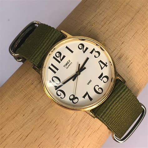 Mavin | Vintage Timex Quartz LA Cell Water Resistant Gold Tone Mens Watch