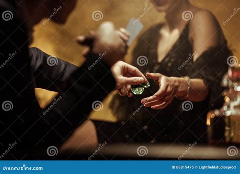 Elegant Couple Playing Poker and Sharing Casino Chips Stock Image ...
