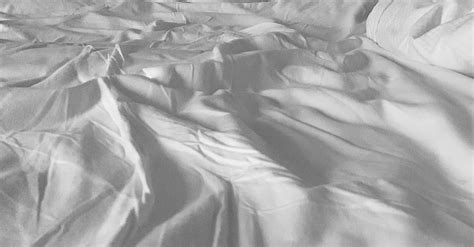 Ruffled White Bed · Free Stock Photo