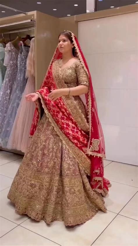 stunning golden bridal lehenga  red dupatta golden bridal lehenga