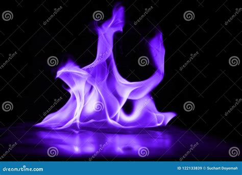 Beautifu Purple Fire Flames on a Black Background. Stock Image - Image