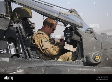 Chief Warrant Officer 2 Mike Bertha, an AH-64 Apache helicopter pilot serving under 2nd ...