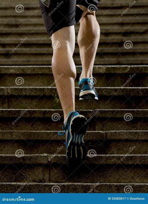 Athlete Man with Strong Leg Muscles Training and Running Urban City